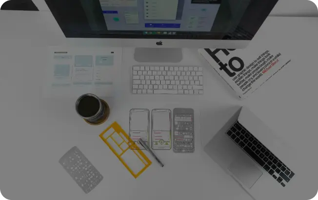 Clean, organized desk featuring design prototypes, reflecting a tidy workspace with focus on project planning.